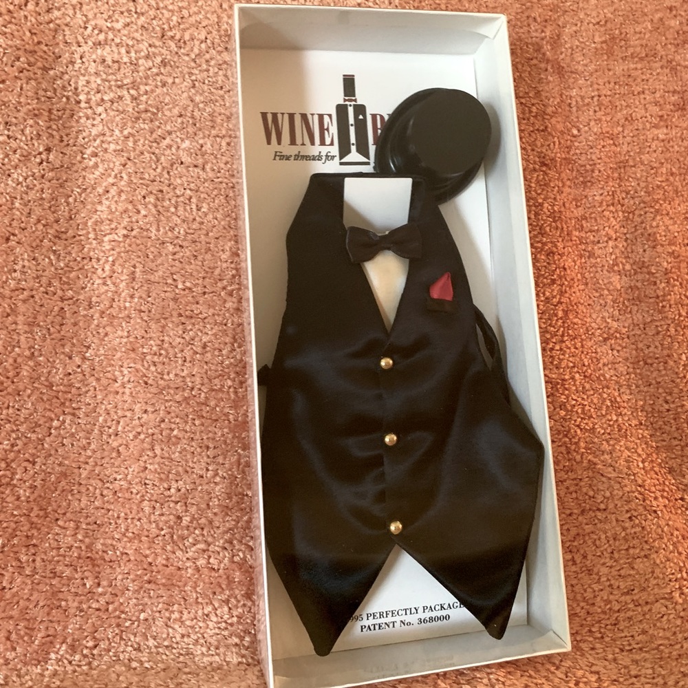 Wine butler.  Vintage fine threads for your whites and reds.